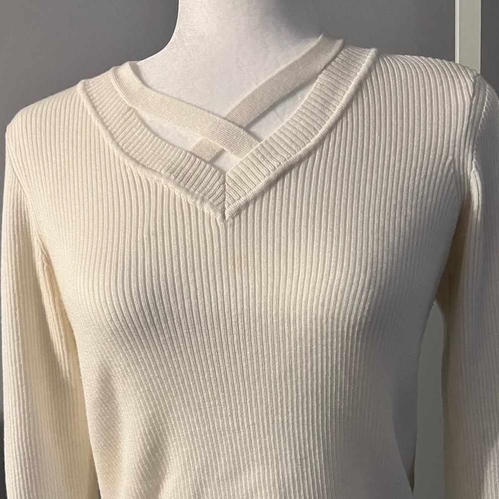 Long sleeve, knit/sweater casual top.